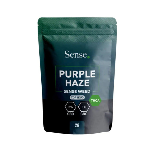 Sense Purple Haze topskud cannabis blomst 2g pose med mørkegrøn og sort emballage samt CBD og CBG indhold fotograferet fra frontvinkel på hvid baggrund.